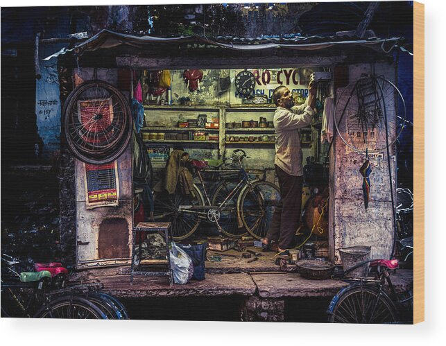 Street Wood Print featuring the photograph The Bike Repairman #1 by Marco Tagliarino