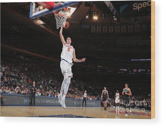 Kristaps Porzingis Wood Print featuring the photograph Brooklyn Nets V New York Knicks by Nathaniel S. Butler