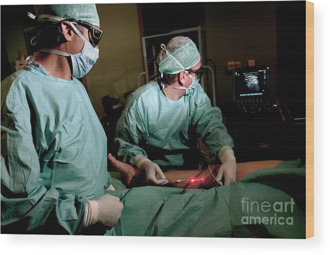 Beam Wood Print featuring the photograph Laser Treatment Of Varicose Veins #2 by Arno Massee/science Photo Library