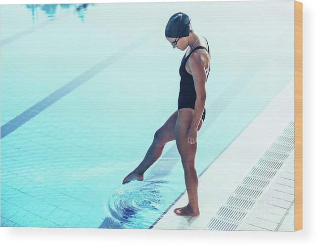 Swimming Wood Print featuring the photograph Swimmer Next To Pool #2 by Microgen Images/science Photo Library