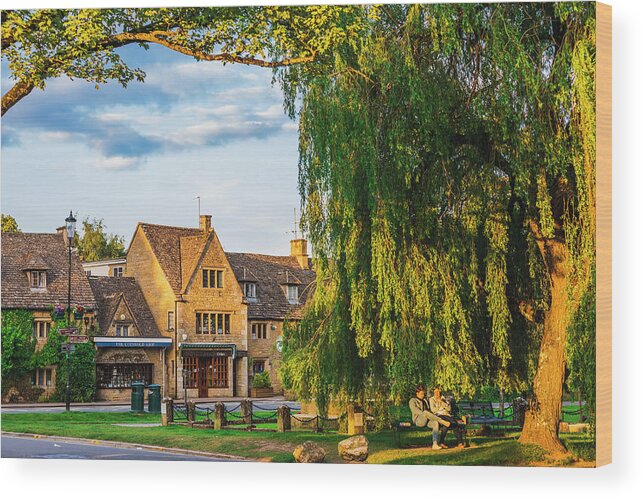 Estock Wood Print featuring the digital art United Kingdom, England, Gloucestershire, Great Britain, Cotswolds, British Isles, Bourton-on-the-water, Tourists Walking By The Water Canals In Bourton-on-the-water At Sunset On A Sunny Summer Afternoon #2 by Maurizio Rellini