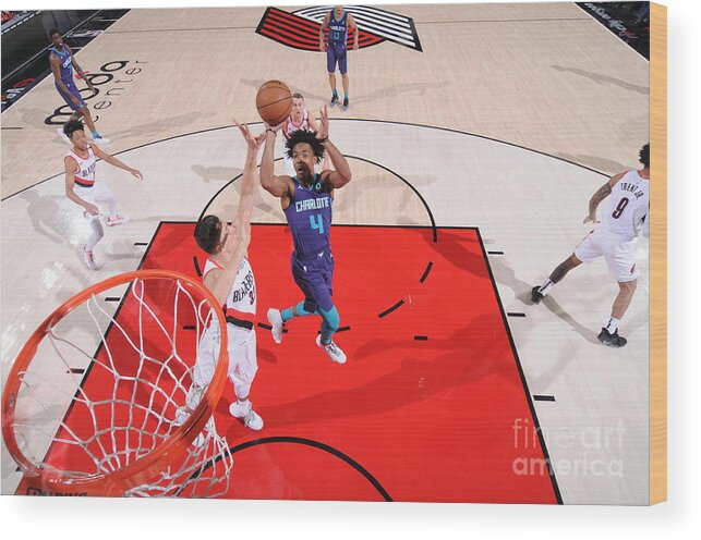Devonte' Graham Wood Print featuring the photograph Charlotte Hornets V Portland Trail by Sam Forencich