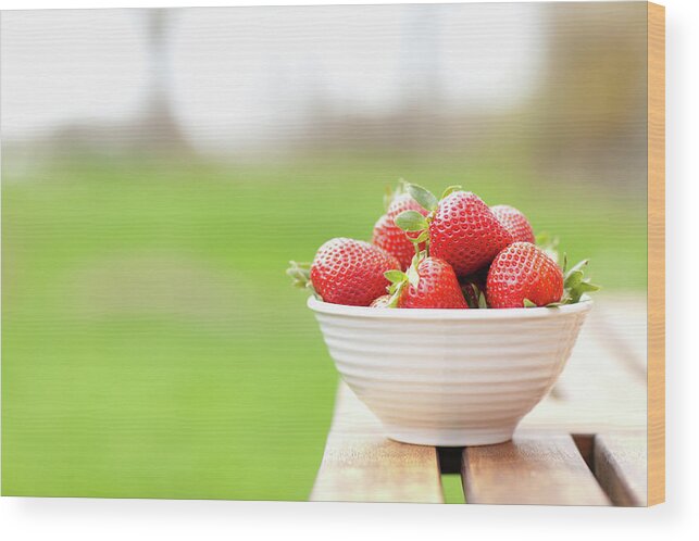 Large Group Of Objects Wood Print featuring the photograph A Bowl Of Stawberries by Michael Hevesy