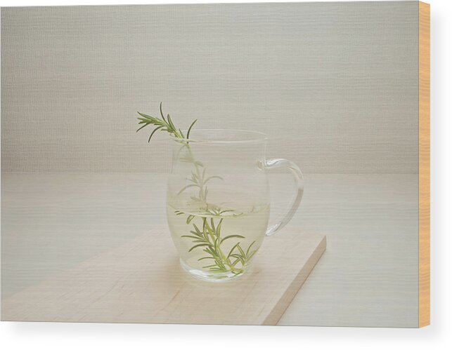 Cutting Board Wood Print featuring the photograph A Cup Of Rosemary Tea by Margarita Komine