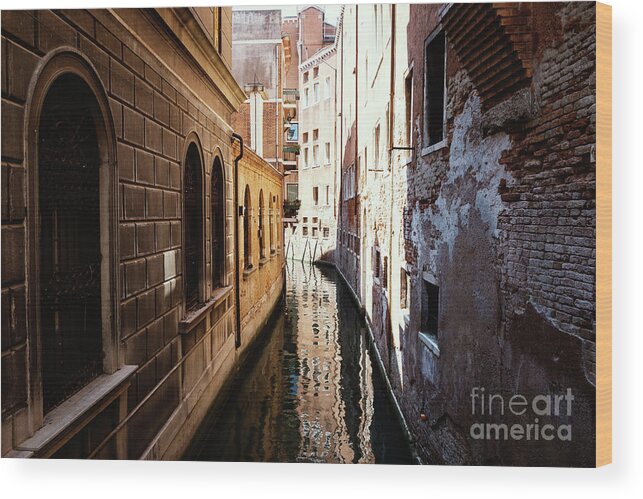 Adriatic Wood Print featuring the photograph A shadow in the venetian noon narrow canal by Marina Usmanskaya