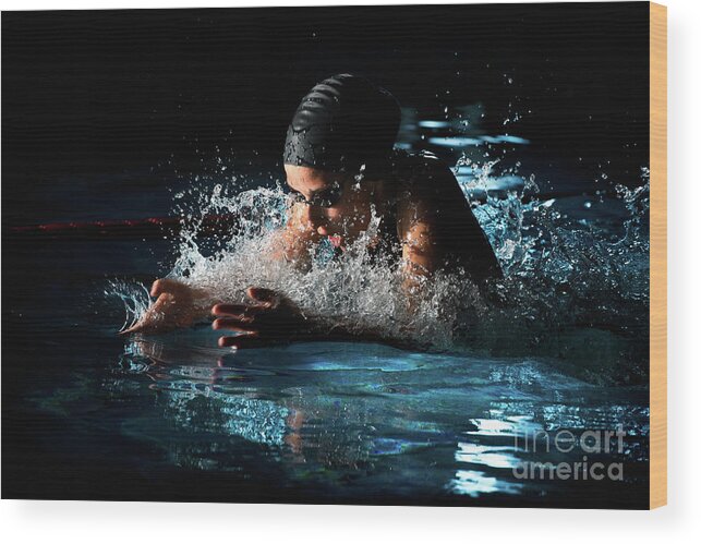 Expertise Wood Print featuring the photograph A Woman Swimming Breaststroke by Stanislaw Pytel