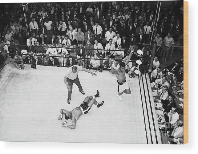 Crowd Of People Wood Print featuring the photograph Ali Defeats Liston by Bettmann