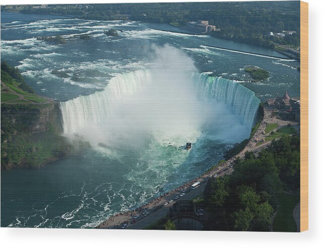 Scenics Wood Print featuring the photograph An Aerial View Of Niagara Falls On A by Fstoplight