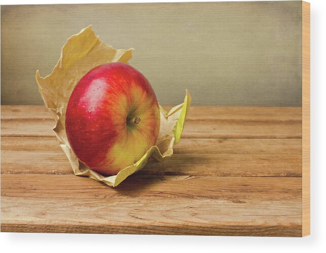 Wood Wood Print featuring the photograph Apple With Paper On Wooden Table by Copyright Anna Nemoy(xaomena)