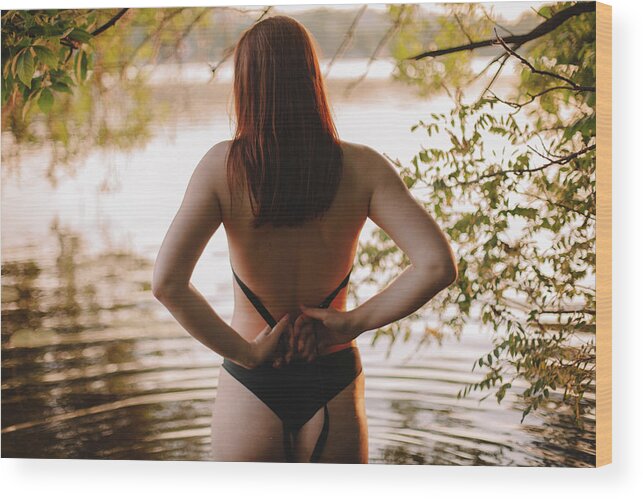 Back View Of Woman Taking Off Her Bikini Top While Standing In Lake Wood  Print by Cavan Images - Fine Art America