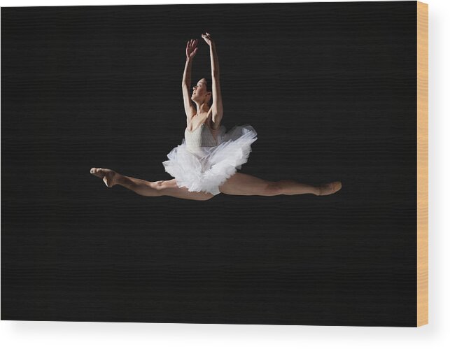 Ballet Dancer Wood Print featuring the photograph Ballerina Grand Jeté by Nisian Hughes
