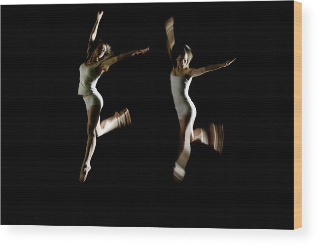 Expertise Wood Print featuring the photograph Ballet And Contemporary Dancers by John Rensten
