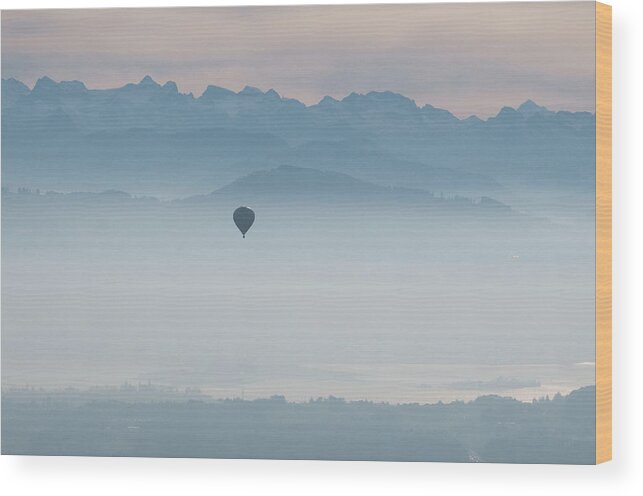Tranquility Wood Print featuring the photograph Balloon In The Mist by Photo By Roman Sandoz