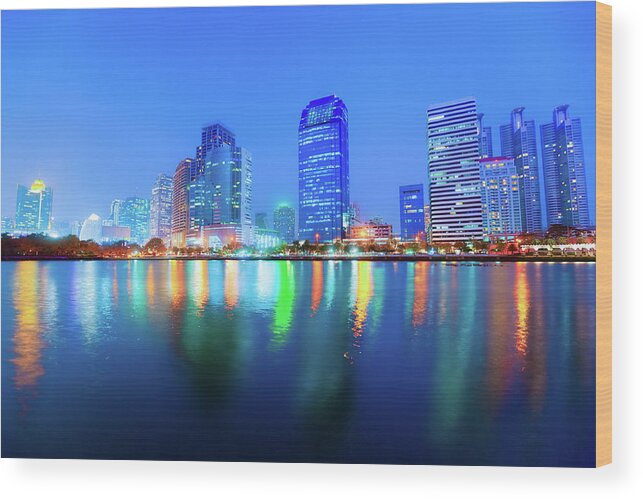 Scenics Wood Print featuring the photograph Bangkok Skyline By Night by Moreiso