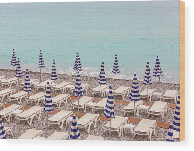 Beach Umbrellas In Nice Wood Print featuring the photograph Beach Umbrellas in Nice by Melanie Alexandra Price