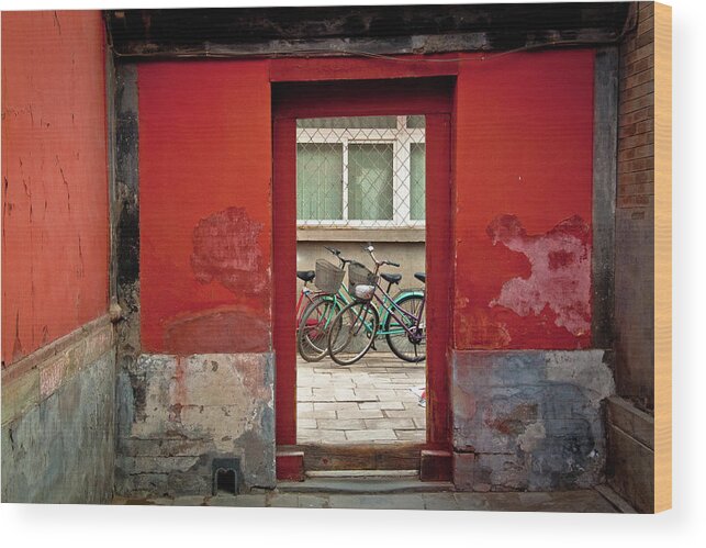Tranquility Wood Print featuring the photograph Bicycles In Red Doorway by Photo By Sharon Drummond