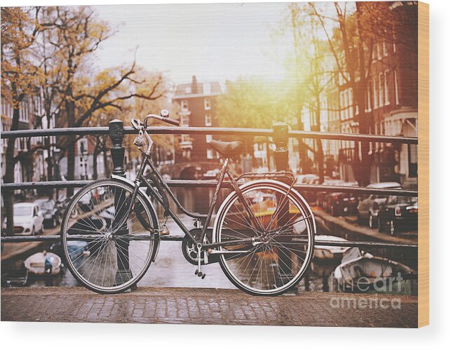 North Holland Wood Print featuring the photograph Bicycles Parked On A Bridge In Amsterdam by Serts