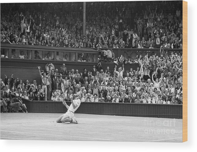 1980-1989 Wood Print featuring the photograph Bjorn Borg Kneeling In Stadium After Win by Bettmann