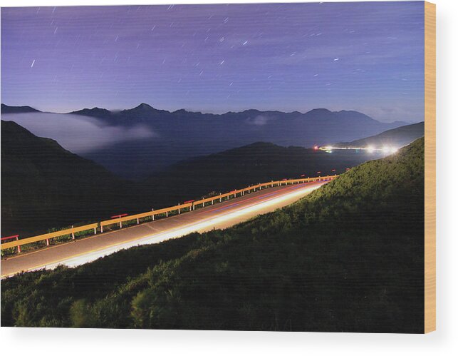 Tranquility Wood Print featuring the photograph Car Light Trails And Star Trails At by Samyaoo