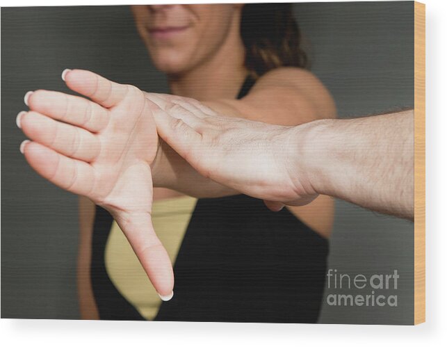 Physical Therapy Wood Print featuring the photograph Chiropractor Examining Patient by Microgen Images/science Photo Library