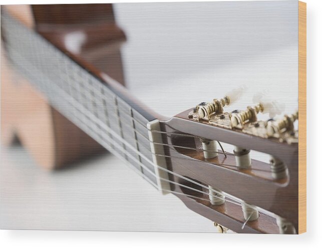 White Background Wood Print featuring the photograph Close-up Of A Guitar by Jamie Grill
