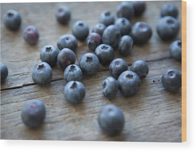 Large Group Of Objects Wood Print featuring the photograph Close-up Of Blueberries On Table by Halfdark