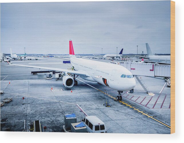 Airport Departure Area Wood Print featuring the photograph Commercial Jet At Gate by Grandriver