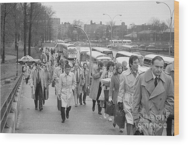 Employment And Labor Wood Print featuring the photograph Commuters Leaving Buses by Bettmann