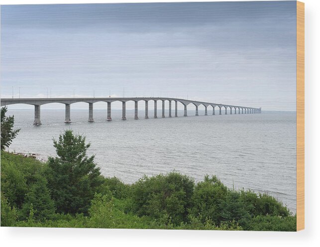 Freight Transportation Wood Print featuring the photograph Confederation Bridge Connecting New by Brytta
