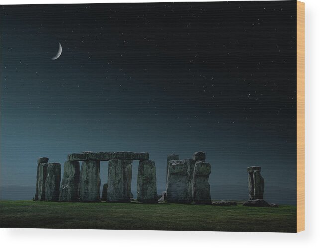 Tranquility Wood Print featuring the photograph Crescent Moon Over Stonehenge Monument by Chris Clor