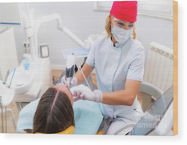 Dental Wood Print featuring the photograph Dentist Using 3d Camera For Tooth Reconstruction Procedure by Microgen Images/science Photo Library