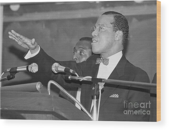 Louis Farrakhan Wood Print featuring the photograph Farrakhan Gestures by Bettmann