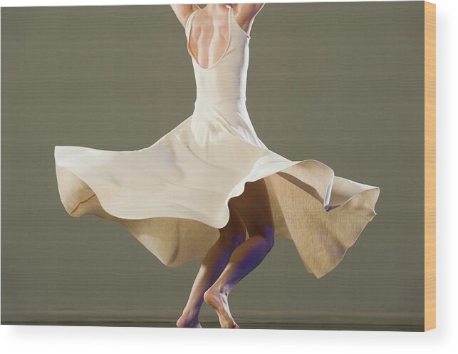 Ballet Dancer Wood Print featuring the photograph Female Ballet Dancer Dancing by Erik Isakson