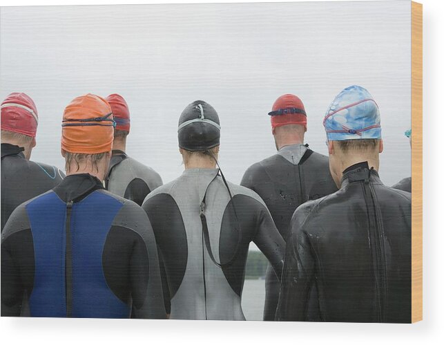 People Wood Print featuring the photograph Group Of Triathletes Standing By Lake by Lothar Schulz