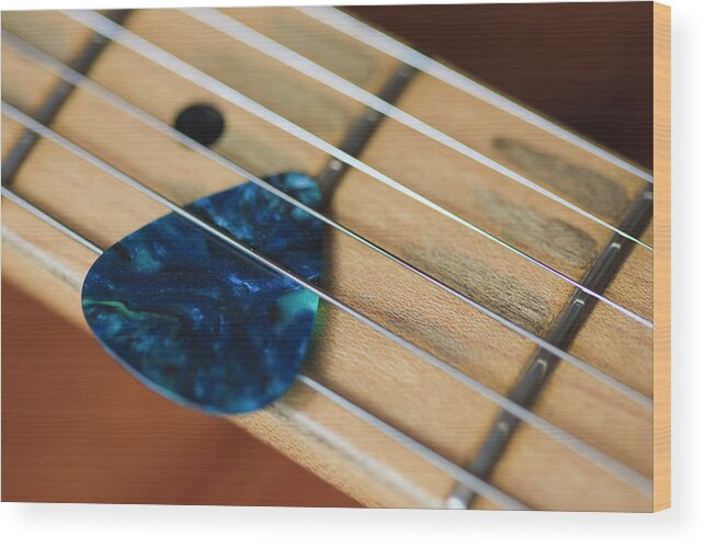 Sheet Music Wood Print featuring the photograph Guitar Strings And Plectrum by Fraser Hall