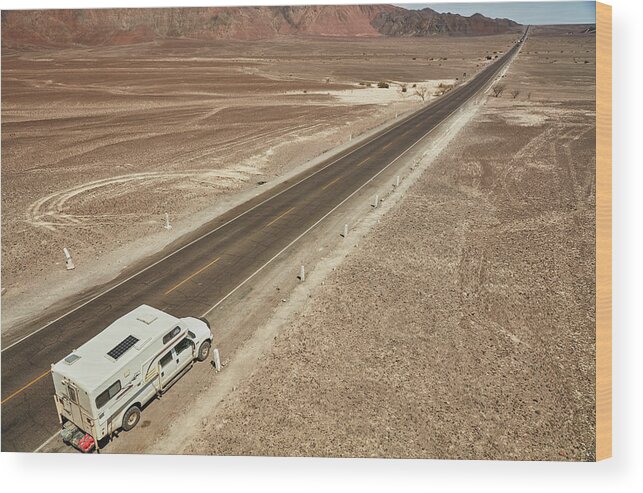 Diminishing Perspective Wood Print featuring the digital art High Angle View Of Campervan Parked On Desert Roadside, Hacienda Ventilla, Ica, Peru by Stefan Schuetz