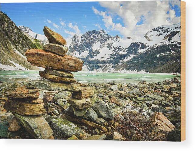 Mountains Wood Print featuring the photograph Inukshuk on the shore, Icy Lake, Canada by Shawna and Damien Richard