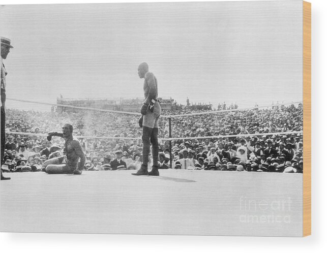 Crowd Of People Wood Print featuring the photograph Jack Johnson In Ring With Fallen James by Bettmann