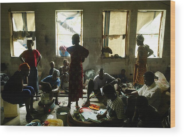 Crowd Wood Print featuring the photograph Liberians Flee Fighting To The Capital by Chris Hondros