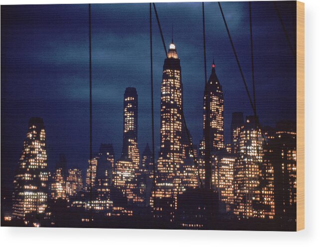 04/17/06 Wood Print featuring the photograph Lower Manhattan Skyline by Andreas Feininger