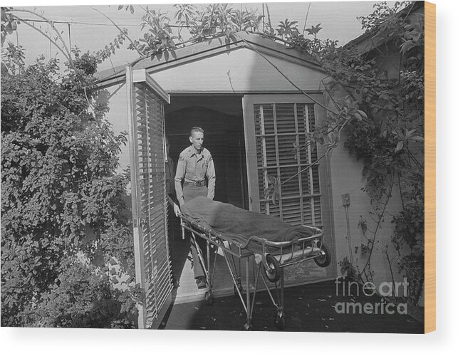 People Wood Print featuring the photograph Marilyn Monroe Removed From Home by Bettmann