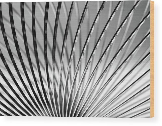 Full Frame Wood Print featuring the photograph Metal Slinky by Deceptive Media