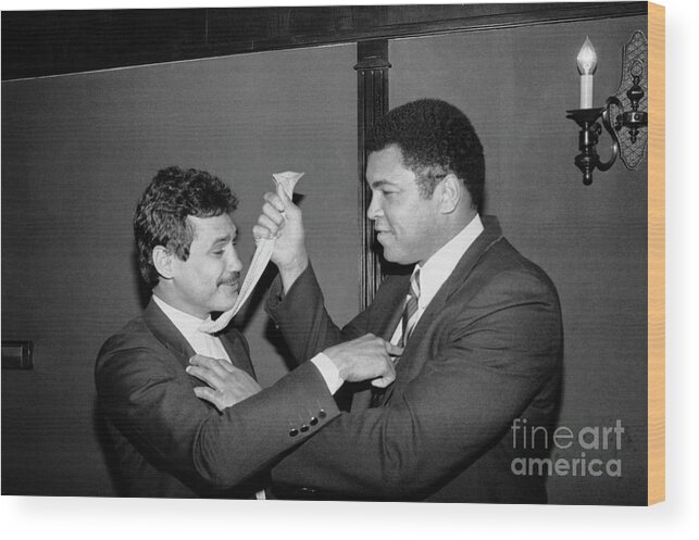 Crown Wood Print featuring the photograph Muhammad Ali Adjusting Alexis Arguellos by Bettmann