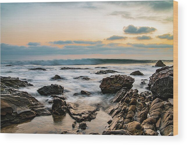 Local Snaps Photography Wood Print featuring the photograph Painted waves on rocky beach sunset by Local Snaps Photography