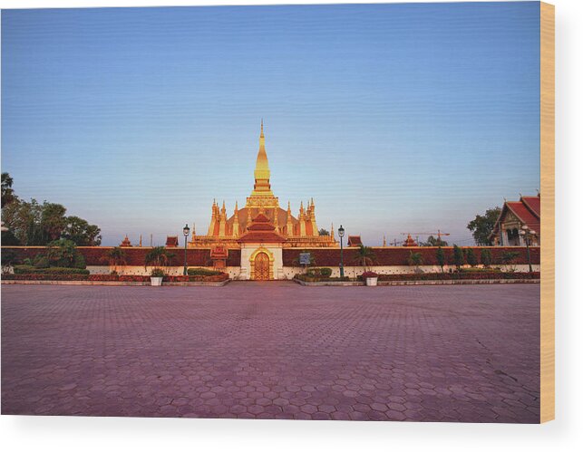 Monument Wood Print featuring the photograph Pha That Luang Stupa At Sunset by Fototrav