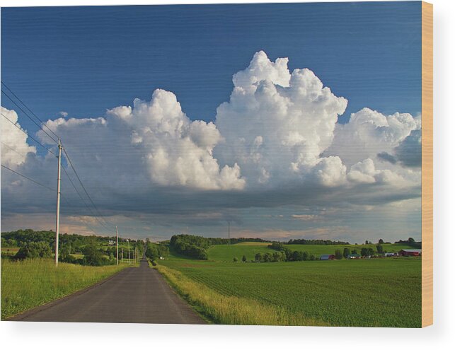 Tranquility Wood Print featuring the photograph Puffysummer Clouds And Country Farm Road by Matt Champlin