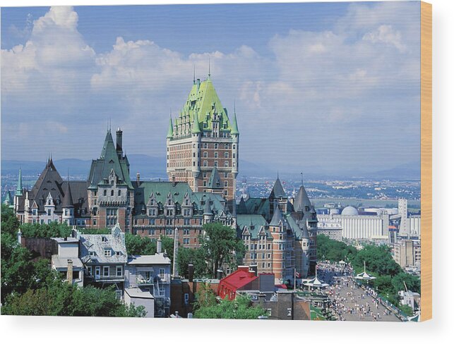 Downtown District Wood Print featuring the photograph Quebec City Chateau Frontenac by Laughingmango