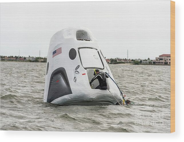 Crew Dragon Wood Print featuring the photograph Recovery Training For Crew Dragon Spacecraft by Spacex/nasa/science Photo Library