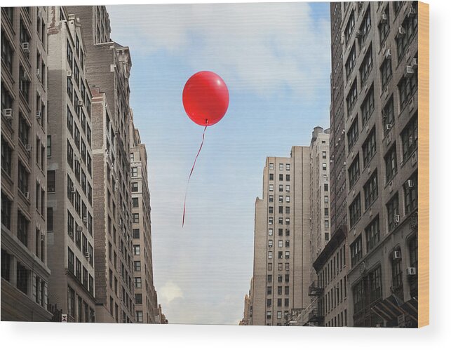 Apartment Wood Print featuring the photograph Red Balloon Floating Through City by Thomas Jackson