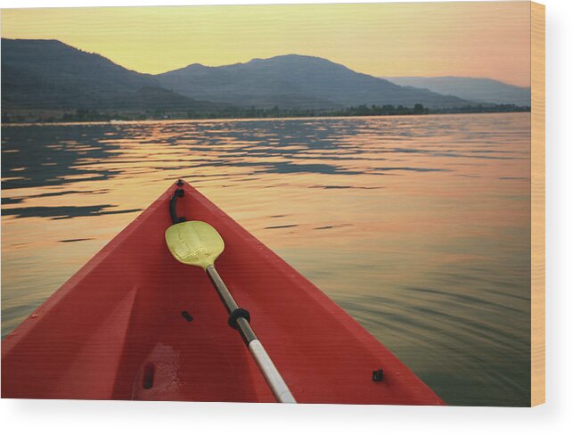 Recreational Pursuit Wood Print featuring the photograph Red Canoe On A Beautiful Mountain Lake by Imaginegolf